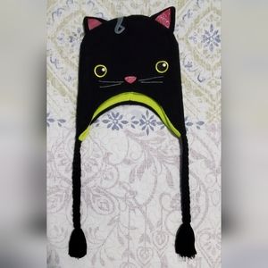 Cat knitted hat with braids.